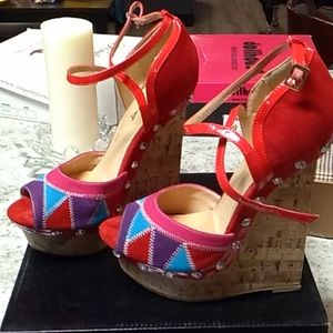 Black and maroon suede heels